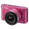 Фото Цифровые фотоаппараты Nikon 1 J2 10-30 VR Kit Rose