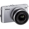 Фото Цифровые фотоаппараты Nikon 1 J3 10-30 VR Kit Silver