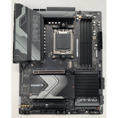 Материнська плата Gigabyte X670 GAMING X AX (sAM5, AMD X670) (Відновлено продавцем, 661358) купити з перевіркою сумісності: огляд, характеристики, ціна у Києві, Львові, Вінниці, Хмельницькому, Івано-Франківську, Україні | інтернет-магазин TELEMART.UA фото