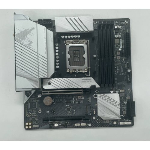 Материнська плата Gigabyte B760M AORUS ELITE AX (s1700, Intel B760) (Відновлено продавцем, 662747) купити з перевіркою сумісності: огляд, характеристики, ціна у Києві, Львові, Вінниці, Хмельницькому, Івано-Франківську, Україні | інтернет-магазин TELEMART.UA фото