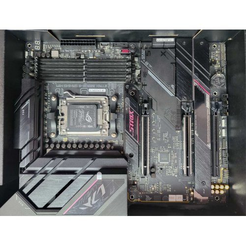 Уцінка материнська плата Asus ROG STRIX B650E-E GAMING WIFI (sAM5, AMD B650) (Сліди встановлення, 687344) купити з перевіркою сумісності: огляд, характеристики, ціна у Києві, Львові, Вінниці, Хмельницькому, Івано-Франківську, Україні | інтернет-магазин TELEMART.UA фото