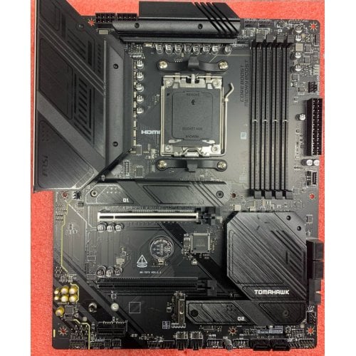 Уцінка материнська плата MSI MAG B650 TOMAHAWK WIFI (sAM5, AMD B650) (Сліди встановлення, 713104) купити з перевіркою сумісності: огляд, характеристики, ціна у Києві, Львові, Вінниці, Хмельницькому, Івано-Франківську, Україні | інтернет-магазин TELEMART.UA фото