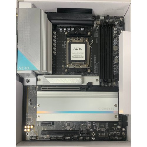 Купить Уценка материнская плата Gigabyte B650 AERO G (sAM5, AMD B650) (Следы установки, 722742) с проверкой совместимости: обзор, характеристики, цена в Киеве, Днепре, Одессе, Харькове, Украине | интернет-магазин TELEMART.UA фото