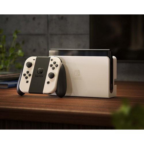 Купити Ігрова консоль Nintendo Switch OLED (45496883386) White - ціна в Києві, Львові, Вінниці, Хмельницькому, Франківську, Україні | інтернет-магазин TELEMART.UA фото
