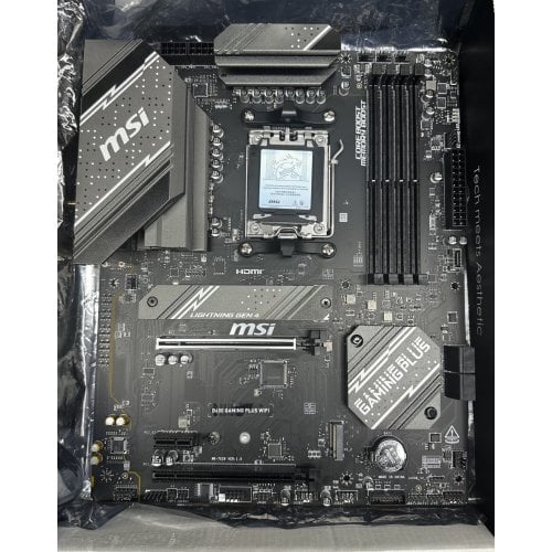 Уцінка материнська плата MSI B650 GAMING PLUS WIFI (sAM5, AMD B650) (Нерідне пакування, 772379) купити з перевіркою сумісності: огляд, характеристики, ціна у Києві, Львові, Вінниці, Хмельницькому, Івано-Франківську, Україні | інтернет-магазин TELEMART.UA фото