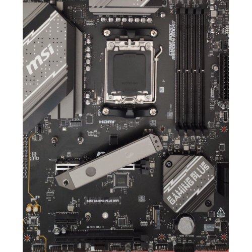 Купить Уценка материнская плата MSI B650 GAMING PLUS WIFI (sAM5, AMD B650) (Следы , 773562) с проверкой совместимости: обзор, характеристики, цена в Киеве, Днепре, Одессе, Харькове, Украине | интернет-магазин TELEMART.UA фото