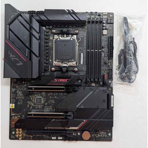 Купить Материнская плата Asus ROG STRIX B650E-E GAMING WIFI (sAM5, AMD B650) (Восстановлено продавцом, 779614) с проверкой совместимости: обзор, характеристики, цена в Киеве, Днепре, Одессе, Харькове, Украине | интернет-магазин TELEMART.UA фото