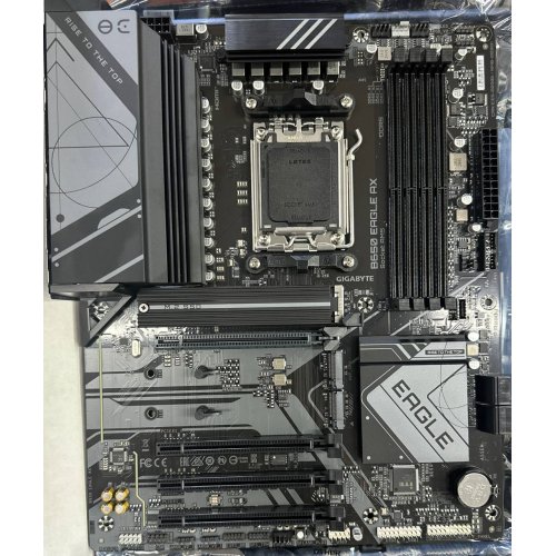 Купить Уценка материнская плата Gigabyte B650 EAGLE AX (sAM5, AMD B650) (Следы установки, 783496) с проверкой совместимости: обзор, характеристики, цена в Киеве, Днепре, Одессе, Харькове, Украине | интернет-магазин TELEMART.UA фото