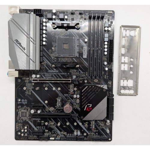 Купить Материнская плата AsRock X570 Phantom Gaming 4 (sAM4, AMD X570) (Восстановлено продавцом, 796292) с проверкой совместимости: обзор, характеристики, цена в Киеве, Днепре, Одессе, Харькове, Украине | интернет-магазин TELEMART.UA фото