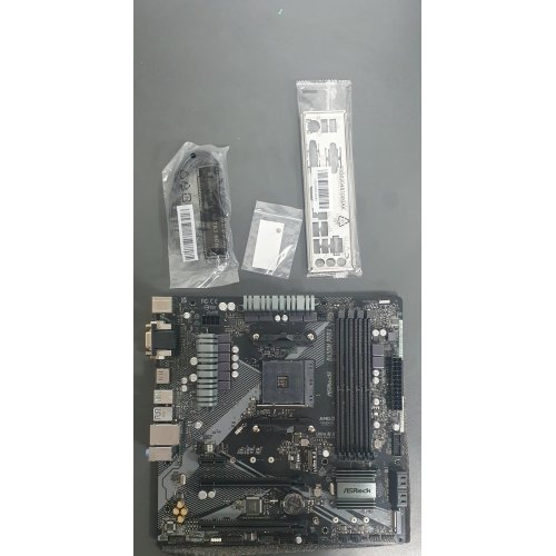 Купить Уценка материнская плата AsRock B450M Pro4 R2.0 (sAM4, AMD B450) (Повреждена упаковка, 801988) с проверкой совместимости: обзор, характеристики, цена в Киеве, Днепре, Одессе, Харькове, Украине | интернет-магазин TELEMART.UA фото