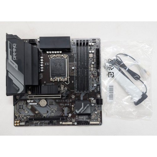 Материнська плата Gigabyte B760M GAMING X AX (s1700, Intel B760) (Відновлено продавцем, 805301) купити в Україні: Київ, Львів, Хмельницький, Тернопіль | Перевірка сумісності, низька ціна, відгуки, характеристики від TELEMART фото