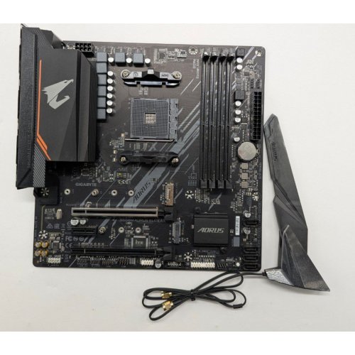Материнська плата Gigabyte B550M AORUS ELITE AX (sAM4, AMD B550) (Відновлено продавцем, 842735) купити в Україні: Київ, Львів, Хмельницький, Тернопіль, Івано-Франківськ | Перевірка сумісності, низька ціна, відгуки, характеристики від TELEMART фото