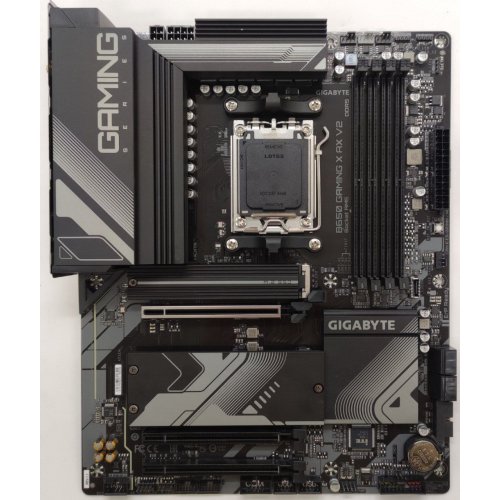 Материнская плата Gigabyte B650 GAMING X AX V2 (sAM5, AMD B650) (Восстановлено продавцом, 843116) купить в Украине: Киев, Днепр, Харьков, Одесса  | Проверка совместимости, низкая цена, отзывы, характеристики от TELEMART фото