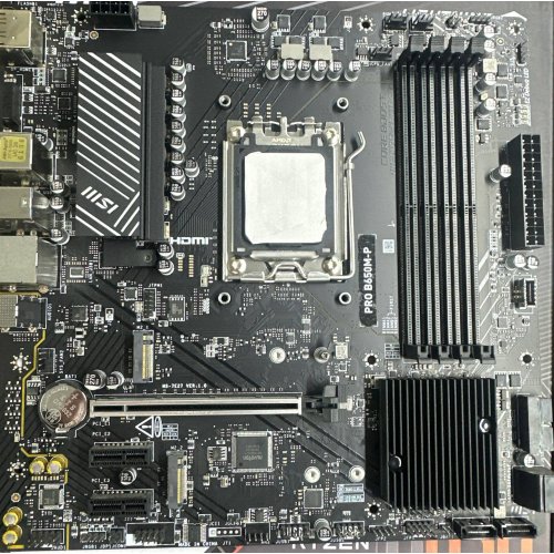Уценка материнская плата MSI PRO B650M-P (sAM5, AMD B650) (Следы установки, 852884) купить в Украине: Киев, Днепр, Харьков, Одесса  | Проверка совместимости, низкая цена, отзывы, характеристики от TELEMART фото