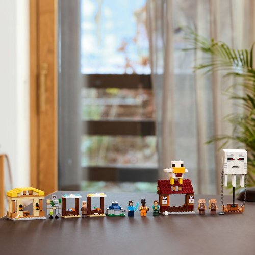 Конструктор LEGO Minecraft Напад на село з повітряною кулею Ґаст 555 деталей (21273) купити в Україні: Київ, Львів, Хмельницький, Тернопіль, Івано-Франківськ | Низька ціна, відгуки, характеристики від TELEMART фото