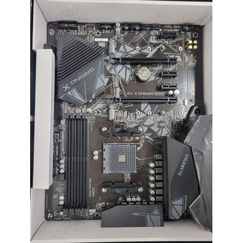 Уценка материнская плата Gigabyte B550 GAMING X V2 (sAM4, AMD B550) (Следы использования, 859165) купить в Украине: Киев, Днепр, Харьков, Одесса  | Проверка совместимости, низкая цена, отзывы, характеристики от TELEMART фото