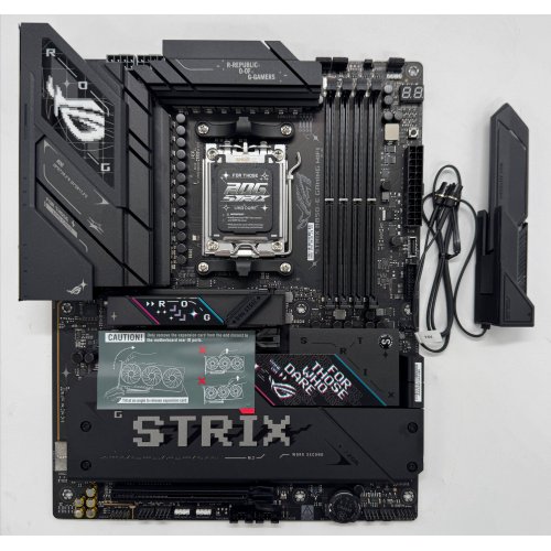 Материнська плата Asus ROG STRIX B850-E GAMING WIFI (sAM5, AMD B850) (Відновлено продавцем, 867798) купити в Україні: Київ, Львів, Хмельницький, Тернопіль, Івано-Франківськ | Перевірка сумісності, низька ціна, відгуки, характеристики від TELEMART фото