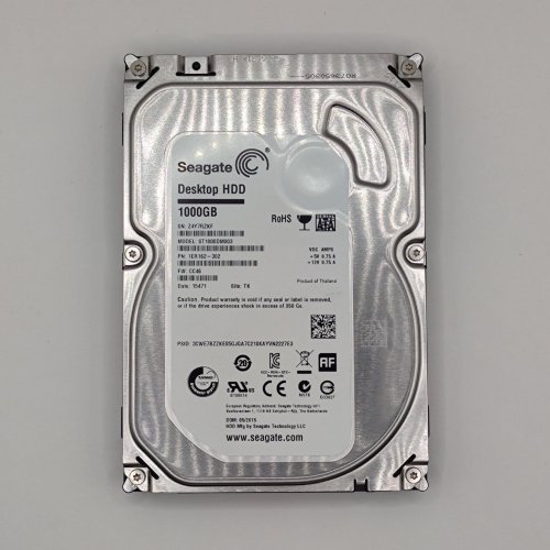 Жорсткий диск Seagate Barracuda 7200.14 1TB 64MB 7200RPM 3.5" (ST1000DM003) (Відновлено продавцем, 868054) купити в Україні: Київ, Львів, Хмельницький, Тернопіль, Івано-Франківськ | Перевірка сумісності, низька ціна, відгуки, характеристики від TELEMART фото