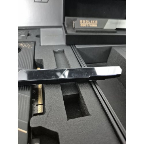 Уцінка материнська плата MSI MEG X870E GODLIKE X EDITION (sAM5, AMD X870E) (Сліди використання, 870482) купити в Україні: Київ, Львів, Хмельницький, Тернопіль, Івано-Франківськ | Перевірка сумісності, низька ціна, відгуки, характеристики від TELEMART фото