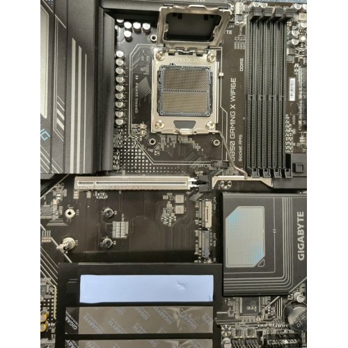 Уцінка материнська плата Gigabyte B850 GAMING X WIFI6E (sAM5, AMD B850) (Сліди використання, 871038) купити в Україні: Київ, Львів, Хмельницький, Тернопіль, Івано-Франківськ | Перевірка сумісності, низька ціна, відгуки, характеристики від TELEMART фото
