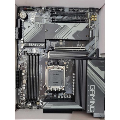 Уценка материнская плата Gigabyte B650 GAMING X AX V2 (sAM5, AMD B650) (Следы использования, 880719) купить в Украине: Киев, Днепр, Харьков, Одесса  | Проверка совместимости, низкая цена, отзывы, характеристики от TELEMART фото
