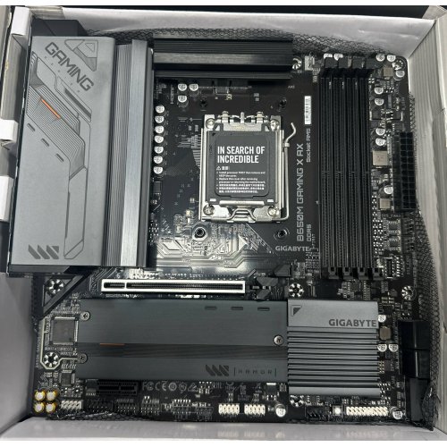 Уценка материнская плата Gigabyte B650M GAMING X AX (sAM5, AMD B650) (Следы использования, неродная коробка, без Wifi антенны, 880951) купить в Украине: Киев, Днепр, Харьков, Одесса  | Проверка совместимости, низкая цена, отзывы, характеристики от TELEMART фото