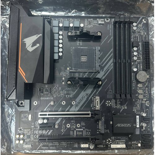 Уценка материнская плата Gigabyte B550M AORUS ELITE (sAM4, AMD B550) (Витринный образец, неродная коробка, 880995) купить в Украине: Киев, Днепр, Харьков, Одесса  | Проверка совместимости, низкая цена, отзывы, характеристики от TELEMART фото