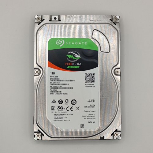 Жорсткий диск Seagate FireCuda (SSHD) 1TB 64MB 7200RPM 3.5'' (ST1000DX002) (Відновлено продавцем, 890956) купити в Україні: Київ, Львів, Хмельницький, Тернопіль, Івано-Франківськ | Перевірка сумісності, низька ціна, відгуки, характеристики від TELEMART фото