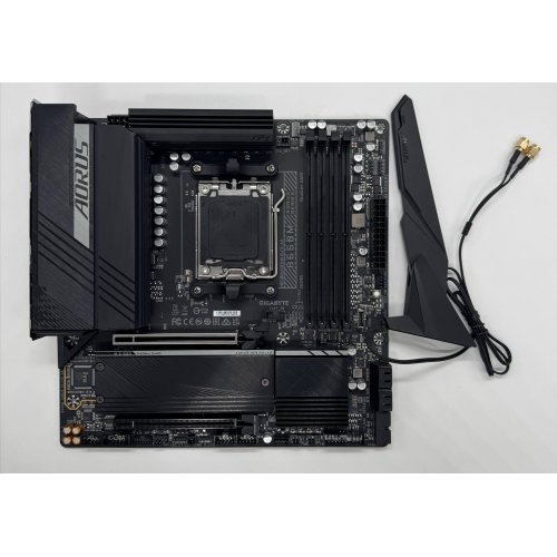 Материнська плата Gigabyte B650M AORUS ELITE AX ICE (sAM5, AMD B650) (Відновлено продавцем, 891861) купити в Україні: Київ, Львів, Хмельницький, Тернопіль, Івано-Франківськ | Перевірка сумісності, низька ціна, відгуки, характеристики від TELEMART фото